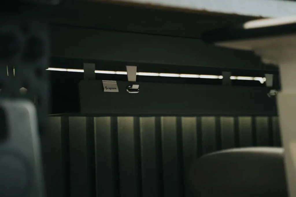 Under-desk cable management tray hiding wires for a clean desk setup